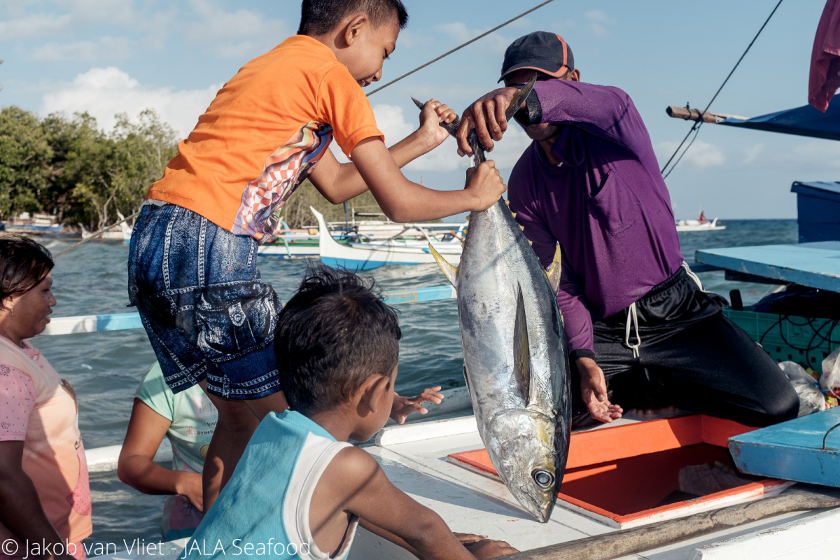 11472850 - Traditional bare hand fishing in DepokSearch